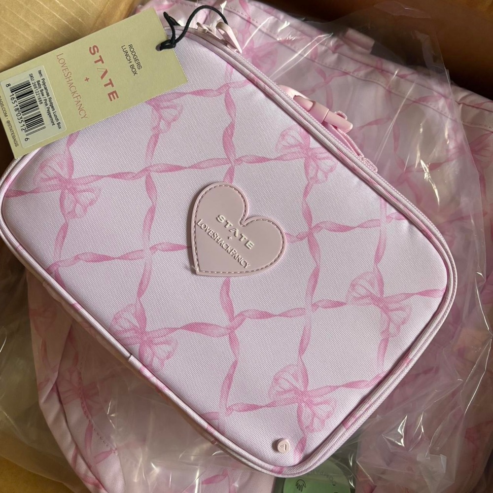 State x Loveshackfancy pink lunch box with pink bow pattern Baby bow